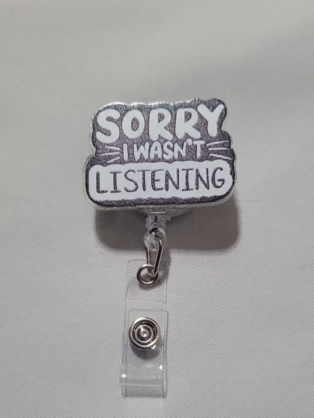 4/$25 "Sorry I Wasn't Listening" Badge Reel